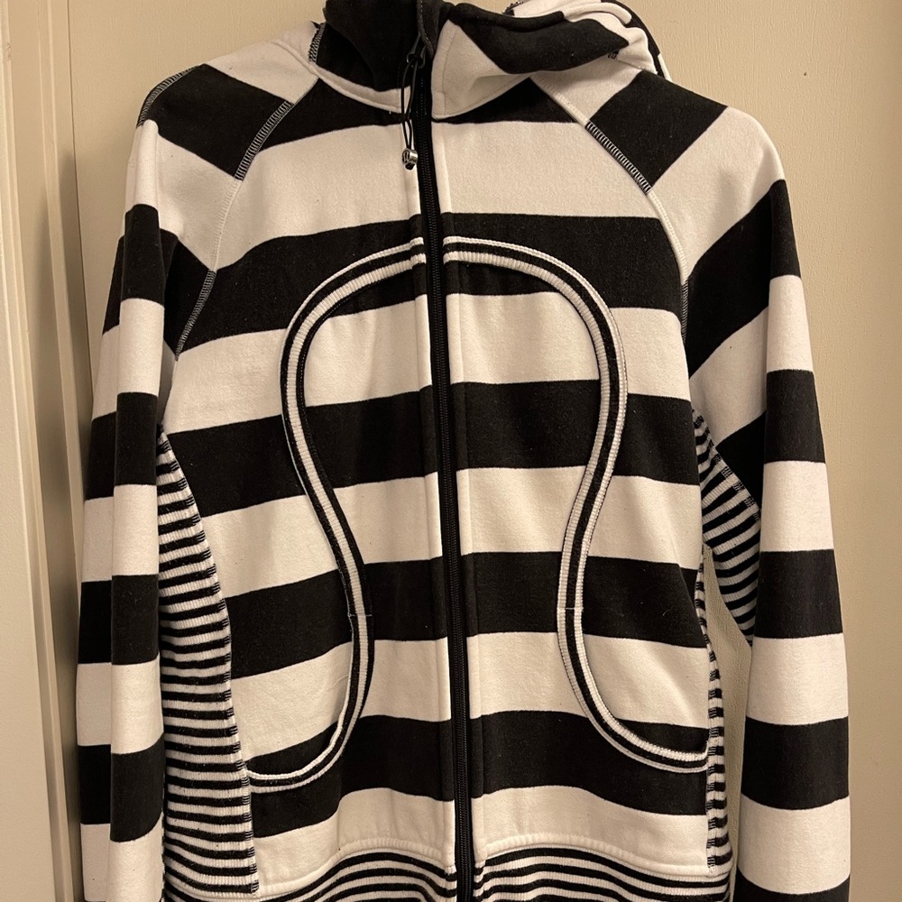 Lululemon jacket. Size 12. Not rip tag. Pet friendly home.